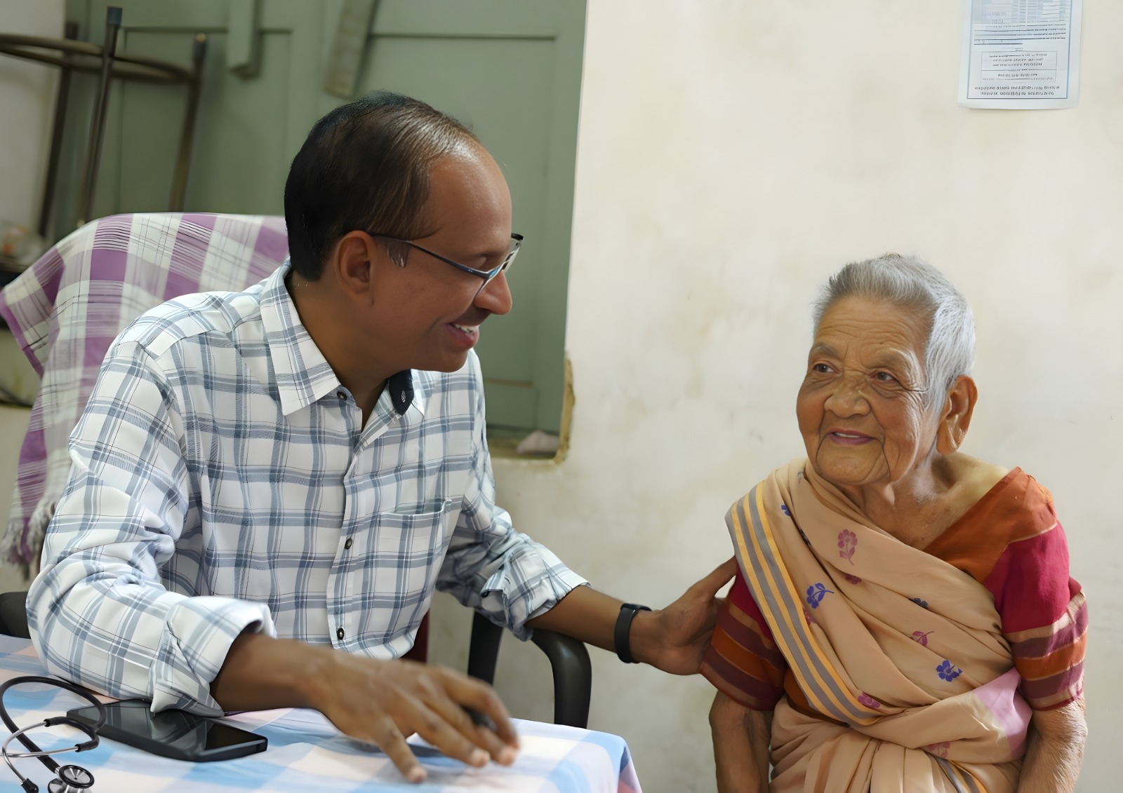 Senior man exercising with dumbbells.
